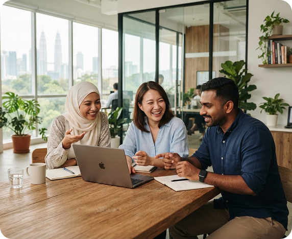 Business team collaborating in a Malaysian office